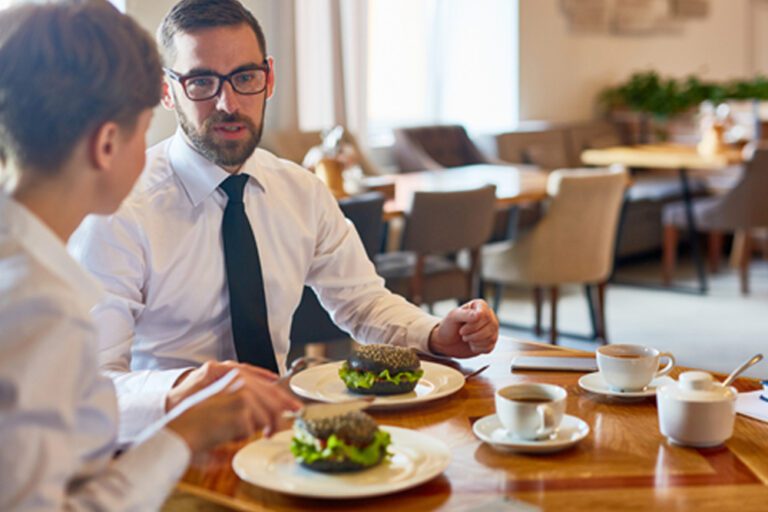 two people eating at a restaurant